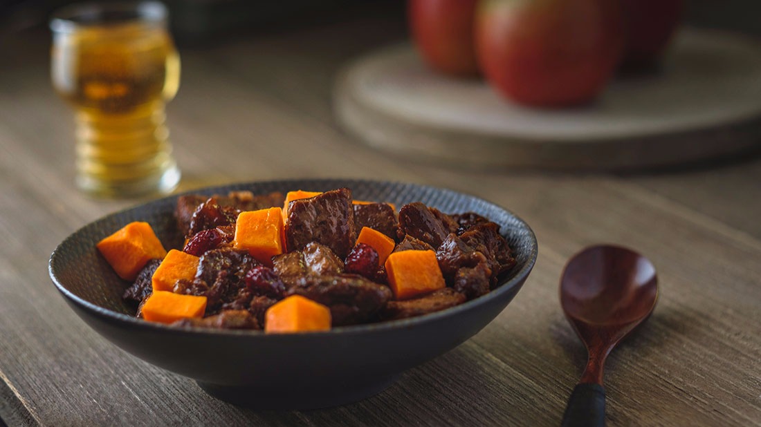 The perfect stew for autumn and fall, this beef stew recipe uses a roast, sweet potatoes and cranberries. 