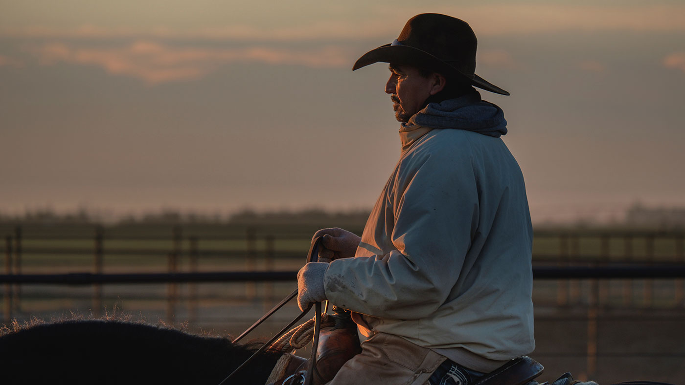 pen rider cowboy riding a horse in kansas