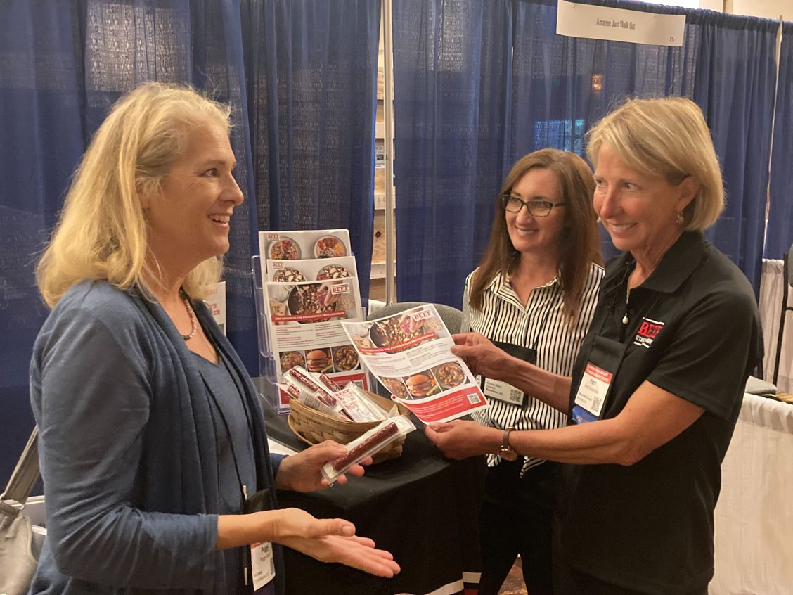 4a53d6e4-6c74-99ed-941a-7e6335360b9b.jpeg Patti Dollarhide interacting with foodservice providers at AHA