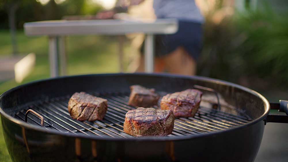steaks on a grill 