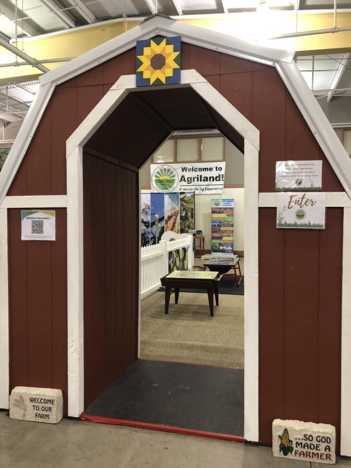 ca0c76c3-0ae7-cce8-427e-211e858b3fd2.jpeg entrance of the Kansas Agriland booth at the Kansas State Fair