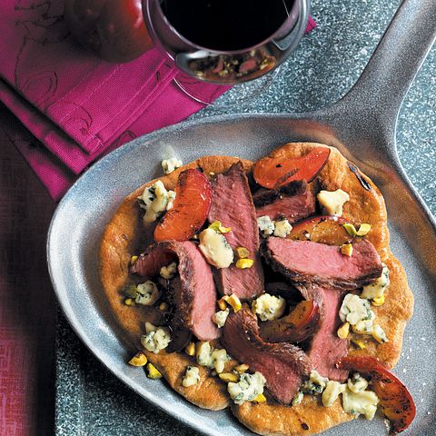 grilled steak and plum pizzettes