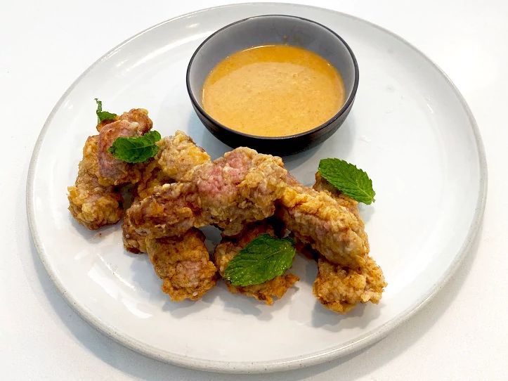 country fried steak bites with hot sauce white gravy
