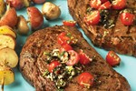 ribeye steaks with fresh tomato tapenade hero shot
