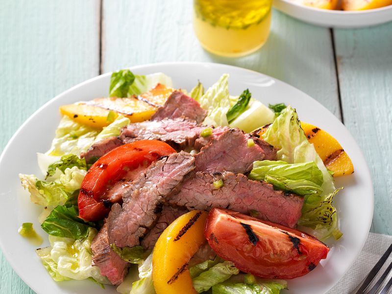grilled flank steak with peach salad hero